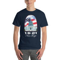 man wearing a shirt with an image of the captiol, american flag flying in the background, and below it says 1-6-21, Never Forget.